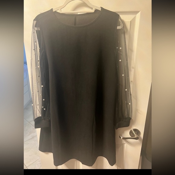 Long sleeve dress with pearls on sheer sleeves. - Picture 1 of 4